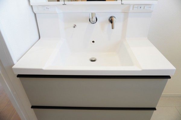 草加市金明町、新築一戸建ての洗面画像です