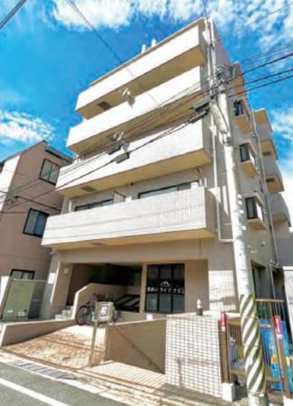 世田谷区、収益物件/住宅付店舗の居間画像です