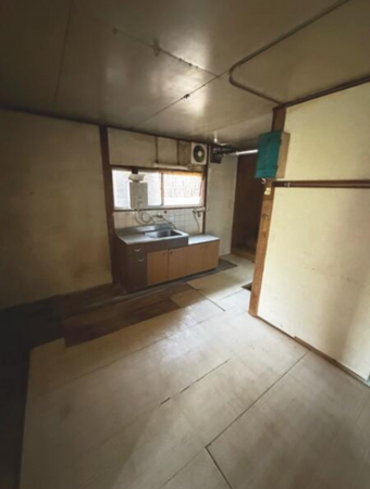 阪南市舞、収益物件/店舗付住宅の居間画像です
