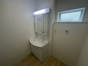 米子市彦名町、新築一戸建ての洗面画像です