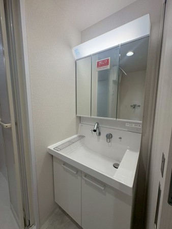 川西市久代、マンションの洗面画像です