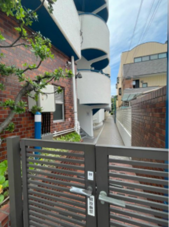 神戸市垂水区海岸通、マンションの玄関画像です