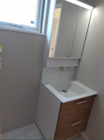 八戸市長根、新築一戸建ての洗面画像です