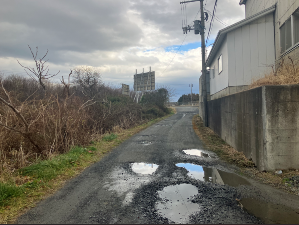 八戸市大字妙、土地の前面道路を含む現地写真画像です