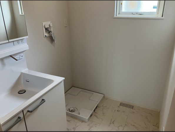 八戸市長苗代、新築一戸建ての洗面画像です