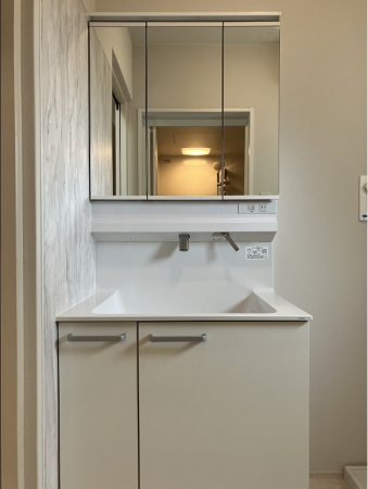 八戸市長苗代、新築一戸建ての洗面画像です