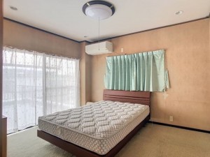 山陽小野田市北竜王町、収益物件/店舗付住宅の寝室画像です