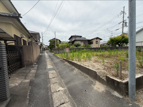 京田辺市大住、土地の前面道路を含む現地写真画像です
