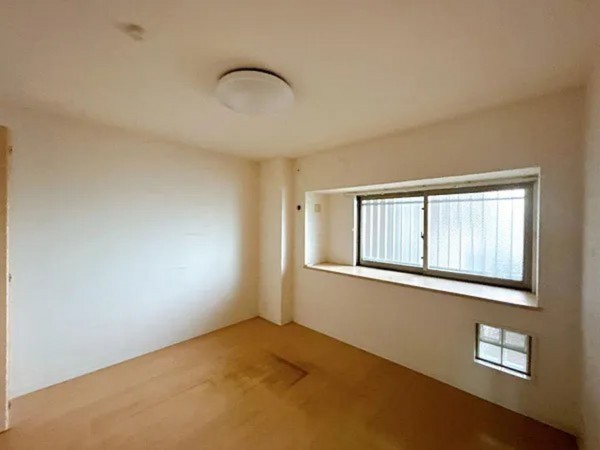 富山市新根塚町、マンションの寝室画像です