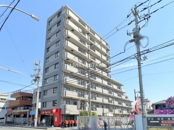 草加市神明、マンションの外観画像です